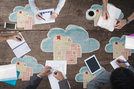 business-meeting-against-overhead-wooden-planks
