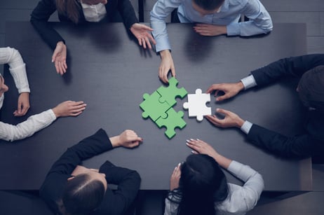 group-business-people-assembling-jigsaw-puzzle-team-support-help-concept