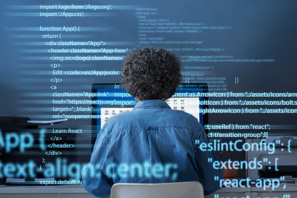 programming-background-with-person-working-with-codes-computer
